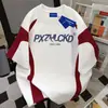 Camiseta de Manga Corta con Estampado de Letras y Bloques de Color Estilo Urbano Unisex Diseño de Verano Casual Top para Parejas Ins