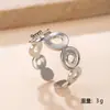 Anillo de Botón Hueco Nuevo Europeo y Americano Colorido Simple Moda Prensado en Aceite Corazón Geométrico Anillo de Acero Inoxidable Joyería