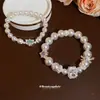 Pulsera de Corazón con Lazo de Azúcar Perlado Estilo Francés, Pulsera Vintage de Lujo Ligero de Gama Alta, Accesorio de Mano Elegante de Moda de Nicho