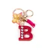 Llavero de Borla de Mariposa con Pedrería Transfronterizo con 26 Opciones de Letras, Colgante de Resina para Bolso, Accesorio de Regalo para Mejores Amigas