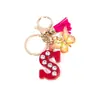 Llavero de Borla de Mariposa con Pedrería Transfronterizo con 26 Opciones de Letras, Colgante de Resina para Bolso, Accesorio de Regalo para Mejores Amigas