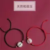 Jade de Hetian Jade Blanco hebilla de seguridad pulsera de cuerda roja pulsera de pareja femenina cumpleaños infantil año Qixi regalo para novia