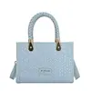Bolsa de Mão com Padrão Trançado de Nicho Transfronteiriça para Mulheres 2026 Nova Tendência Fashion Versátil Bolsa Transversal Bolsa Quadrada Pequena de Alta Qualidade