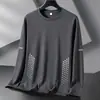 Camiseta informal de manga larga con cuello redondo, color liso, versátil, para hombre, otoño 2026, corte holgado, top moderno