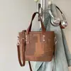 Bolsa Bucket Color Block da Moda para Mulheres Verão 2026 Novo Estilo Coreano Moda Pingente de Estrela Bolsa de Mão para Menina