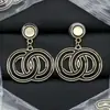 25C Nuevos Pendientes de Alta Gama Estilo Chanel para Mujer, Pendientes Chanel Vintage Doble C Europeos y Americanos, Accesorios de Oreja de Perla para Socialité