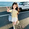 Nuevo Conjunto de Verano para Niñas Mayores: Conjunto de Dos Piezas de Camiseta de Manga Corta con Cordón y Falda con Lazo Dopamina Dulce Moda