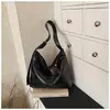 Bolsa de comercio exterior transfronteriza de la fábrica de origen, bolsa tote casual para el día a día, nueva bolsa versátil de color liso para mujer 2026