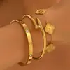 Pulseras transfronterizas de acero de titanio y acero inoxidable, conjuntos de pulseras de acero de titanio a la moda con incrustaciones de diamantes, joyería de trébol de cuatro hojas para mujer, venta al por mayor