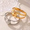 Pulsera de moda europea y americana pulsera de acero de titanio hueca de bola grande diseño de personalidad exagerada joyería al por mayor chapada en oro de 18k