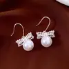 Pendientes de Aro con Perla y Lazo Chapados en Oro Real de 18K Estilo Retro Francés Ganchos para Oreja Pendientes de Moda de Nicho para Mujeres