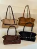 Bolso de Mano Nuevo de Moda Otoño 2026 Hebilla de Cinturón Elegante Bolso de Hombro/Axila Casual de Personalidad de Alto Valor de Nicho