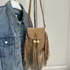 Bolso de Hombro Cruzado Versátil de Diseño de Nicho Otoño Vintage 2026 Nuevo Elegante Mate con Borlas de Gama Alta