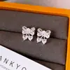 Brincos de Cristal Coração BorboletaZircônia Pérola Laço Tarraxas de Orelha Brilho Luxo High-End Brincos Simples Moda Versátil Acessórios para Orelha