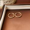 Pendientes de nudo de cuerda con aguja de plata, pendientes de viento de metal de alta calidad, pendientes de temperamento de lujo de nicho, venta al por mayor