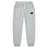 Pantalones deportivos casuales de color liso, holgados, de peso pesado, a la moda, forrados de polar para hombre, de invierno, transfronterizos de Amazon Europa y América
