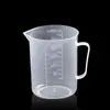 Taza medidora pequeña con escala ml Gramo Recipiente Taza medidora Taza medidora Taza de onzas Pequeña de plástico Estándar ml Transparente