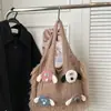 2025 Nuevo Bolso de Mujer Tejido Versátil de Hombro Único de Punto Popular de Comercio Exterior Otoño e Invierno con Bloques de Color Artísticos y Borlas