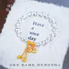 Loja de Ouro Pu Zuo Mesmo Estilo Cor Esmalte Dourado Areia Pingente Arco-Íris Super Brilho Olho de Gato Pulseira de Contas Design de Nicho Exquisite Corda de Mão
