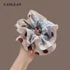 Goma para el pelo de alta gama con estampado de rosas vintage en un delicado color café que hace que la cara se vea más pequeña, perfecta para coletas