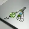 Suerte a la antigua usanzaTrébol de cuatro hojasCordón CCD Corazón de niña con cuentas hechas a mano DIY Encanto de cadena para teléfono Ins