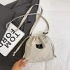 Textura de Moda Casual Nylon Cordón Mensajero Bolso Pequeño 2025 Casual Viajero Bolso de Hombro Moda Viaje Bolso Tipo Cubo