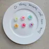 Nuevos Accesorios de Resina de Pétalos y Estambres de Flores Transparentes Dulces Venta al por Mayor Llavero de Pegamento de Crema DIY Funda de Teléfono Crocs