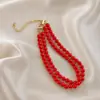 Retro corte estilo Hong Kong elegante clásico Hepburn todo partido cadena de clavícula collar de perlas de vidrio de doble capa traje antiguo cheongsam