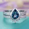 Huajie deseo oferta especial anillo de plata S925 con zircón azul en forma de pera conjunto de anillos populares transfronterizos europeos y americanos para mujer en vacaciones