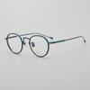 Moda retro marco ovalado moderno montura de gafas ultraligera de titanio puro LO-06 con película anti-luz azul con graduación