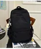 Mochila leve de cor sólida estilo japonês, adequada para viagens ao ar livre, com grande capacidade, versátil para uso casual e ideal como mochila para o dia a dia para estudantes universitários.