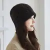 Venta al por mayor transfronteriza 2026 Modelo Nuevo Cachemir Hecho a Mano Crochet Calado Gorro de Punto Gorro de Cachemir Cálido Gorro Protector de Orejas
