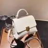 Bolso pequeño cuadrado francés retro simple de alta calidad transfronterizo, bolso de mano versátil de color liso