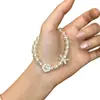Pulseira Suave Estilo Francês com Pérolas Sintéticas, Diamantes e Borboleta Estrela de Cinco Pontas, Pulseira de Contas Luxuosa com uma Vibe de Menina Rica, Estilo Inspirado em Chanel