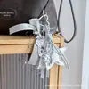 Colgante para Mochila Estilo Miu de Color Dopamina Transfronterizo con Lazo Femenino y Llavero de Perlas para Mochilas