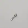 No. 3 Nylon Desgaste Inverso Cabeza de Cremallera Blanca Dorada Fondo Impermeable Colgante Blanco Cabeza de Cremallera Ropa Bolsas Listas para la Venta Suministro Directo de Fábrica al por Mayor