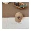Primavera de 2026 Novo Boné de Baseball com Bordado de Urso e Letras para Crianças Chapéu de Sol para Bebê Proteção Solar ao Ar Livre Boné Anti-UV