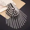 Corea del Sur personalidad remache tridimensional europeo y americano discoteca vintage remache broche punk cono puntiagudo remache borla charretera