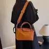 Bolsa Pequena Color-Blocking Tendência de Luxo para Mulheres 2025 Nova Moda Bolsa de Ombro de Mão Versátil Pequena Bolsa Quadrada Transversal