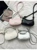 Bolso bandolera simple y elegante para mujer, bolso pequeño de color liso texturizado para verano, nuevo bolso de hombro moderno y a la moda 2026