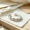 Novo anel de sete grãos de arroz com incrustação de diamante para homens e mulheres design de nicho ins moda retrô método antigo luxo leve anel de dedo ajustável