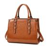 2022 nueva versión coreana de bolso retro de tres piezas de alta gama con textura, para hombro, portátil, bandolera, bandolera para mujer, venta al por mayor de fabricantes