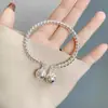 Pulsera de anillo de un paso Palacio Campana femenina borla de seguridad diseño de nicho ins estilo chino Pulsera de campana regalo para amigas