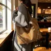 Bolsa de Ombro Transfronteiriça Casual de Grande Capacidade para Mulheres Nova Versátil Outono e Inverno 2025 Bolsa Tote para o Dia a Dia Bolsa Simples de Axila