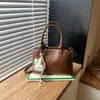 Bolso de Mano Pequeño Estilo Coreano Nuevo Transfronterizo para Mujer, Bolso de Hombro Cruzado Versátil de Color Sólido de Alta Gama Tendencia Verano 2026
