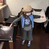 Ropa Infantil Coreana Niñas Otoño 26 Nuevo Estilo Ins Camiseta de Dibujos Animados Elefantito Ropa Infantil Zhili Conjunto de Pantalones Falda de Cubrepañal Rayados