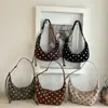 Bolsa de Bolinhas de Nicho Super Quente Feminina 2026 Nova Moda Versátil Bolsa Transversal Estilo Retrô Ombro Único Sobrancelha Bolsa Croissant