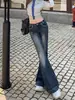 Jeans de pierna acampanada micro de tiro bajo estilo Yi Mengling para mujer 2026 nuevos pantalones acampanados rectos elásticos de chica hot retro