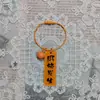 Llavero de acrílico de doble cara con texto de caqui, lindo, creativo y práctico, pequeño regalo, colgante de anillo de alambre