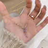 Libro Rojo Pequeño con Nueve Fuego Púrpura Diamante Púrpura Super Hada Collar Diseño Femenino Sentido Hada Zixia Traje Anillo Cadena de Lana